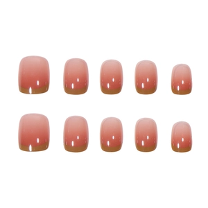 Short square peach pink gradient press-on nails with elegant gold French line tips