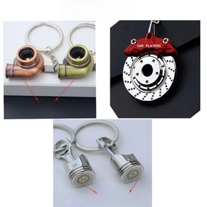 Custom metal car part keychains including turbo and brake disc with logo engraving