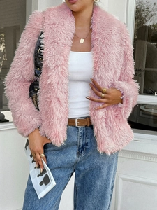 Women's fluffy pink faux fur jacket with long sleeves for fall winter fashion styling