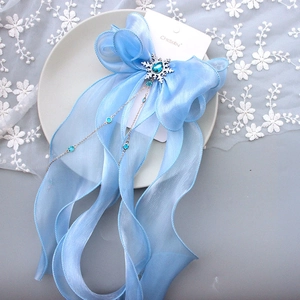 Blue ribbon bow hair clip with snowflake crystal and elegant silver chain pendants