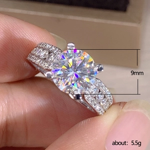 9mm round cut cubic zirconia engagement ring with triple-row pavé band in silver finish