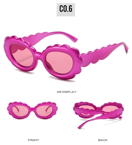 Detailed views of rose pink wavy frame sunglasses showing front, back, and 45-degree angles