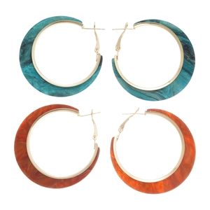 Minimalist geometric acrylic hoop earrings in turquoise and amber with golden metal accents