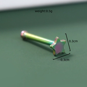 Macro shot of 0.3cm rainbow stainless steel star piercing jewelry with 0.5g weight info