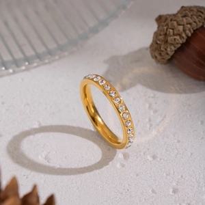 Elegant gold-plated stainless steel ring with micro-paved cubic zirconia on stone base