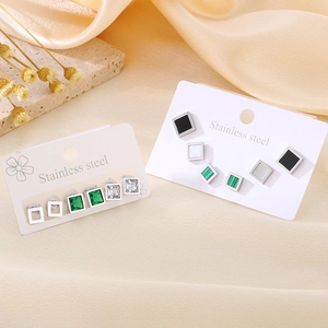 Three pairs of square stainless steel stud earrings in green black and white sets