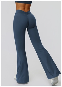 Detail view of high-waisted V-cut yoga flare pants with ruched butt lifting design