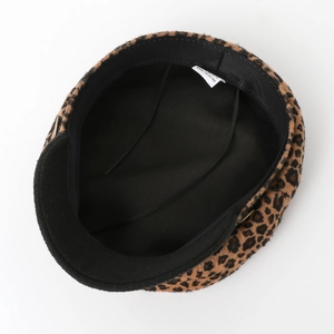 Interior view of leopard print beret featuring adjustable drawstring and soft lining