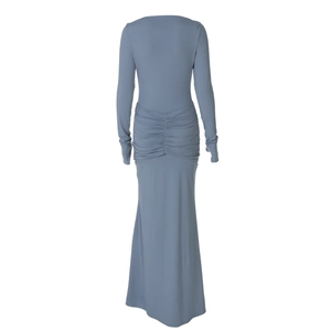 Detail of ruched waist and back draping on a long-sleeved dusty blue maxi dress