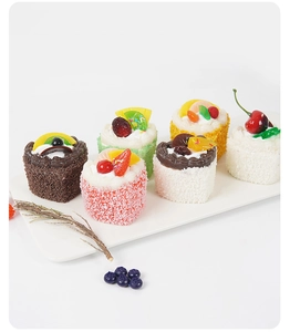 Set of 6 realistic heart mousse cake magnets with faux fruit toppings on a white plate