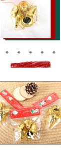 Close-up of golden Christmas bells with hangers in red card packaging for tree decor
