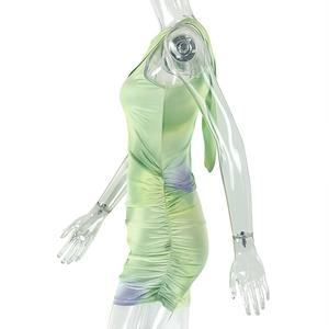 Detail view of ruching on green and purple tie-dye sleeveless slim fit mini dress