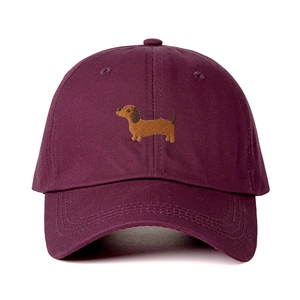 Burgundy cotton baseball cap featuring embroidered brown dachshund dog with curved brim