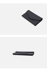 Detail view of the black RFID travel passport wallet with sleek envelope-style design