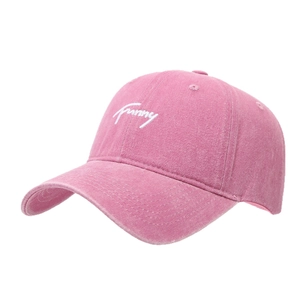 Pink washed cotton baseball cap featuring white Funny embroidery in a front side view