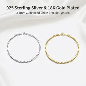S925 sterling silver and 18K gold minimalist bracelet with 2.5mm cube beads on model