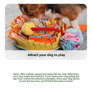 Close-up of colorful felt foraging mat with interactive rope ball for dog scent training