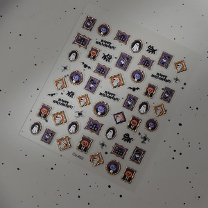 Détail de stickers ongles 3D Halloween avec chauves-souris et citrouilles dorées