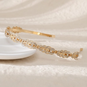 Elegant gold leaf crown headband with sparkling rhinestones for bridal wedding hairstyles