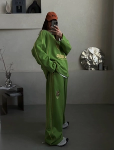 Bright green casual oversized sweatshirt and wide-leg jogger set for women stylish look