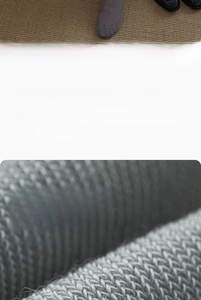 Macro detail of breathable silk business socks for men in dark grey showing soft texture