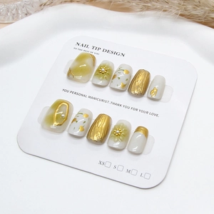 Handmade press-on nails with 3D floral art, gold foil, and tulip designs in avocado green