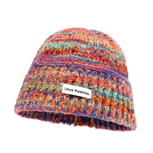 Colorful gradient knit bucket hat with Love Fashion patch for winter warmth and style