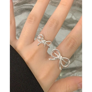 Minimalist S925 sterling silver bow knot ring with irregular wrap design for women