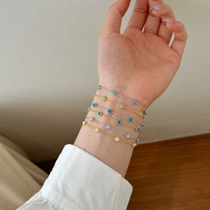 Elegant S925 sterling silver bracelets with opal inlay on female model wrist