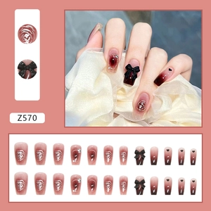 Burgundy gradient press-on nails with silver roses and 3D bows in a long trapezoid shape