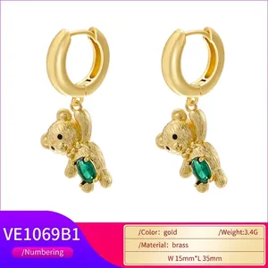 Golden bear hoop earrings with green gemstone drops and polished brass finish
