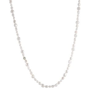Elegant Baroque freshwater pearl necklace with gold-rimmed zircon accent on white background