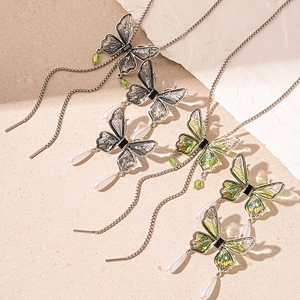 Vintage butterfly tassel necklace with crystal accents and faux pearl charms
