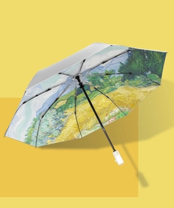 Detail of automatic umbrella interior featuring Van Gogh Wheat Field painting