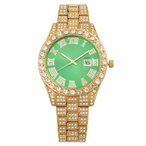 Luxurious gold-tone watch with crystal bezel, green dial, and date window for women