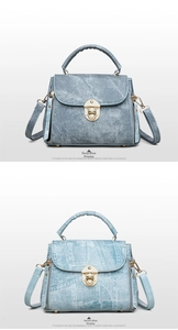 Close-up of denim texture handbags in dark blue and light patterned fabric with gold locks