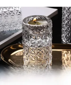 Detailed macro view of high-transparency glass candle holder with star geometric carvings