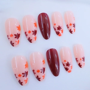 Autumn maple leaf almond press-on nails set with red glossy and nude floral designs