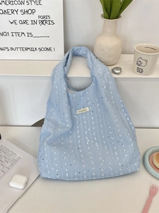 Light blue canvas tote bag with white lace floral appliques and shiny sequins