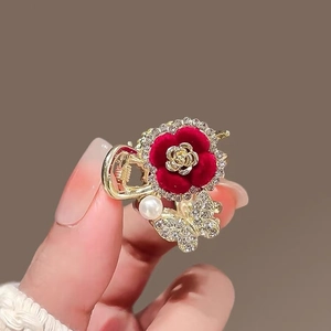 Golden flower hair claw with a red velvet blossom, crystal butterfly and pearl pendant