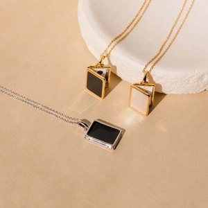 Shell inlay locket necklaces in gold and silver finishes with magnetic photo compartments