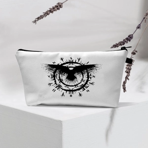 Detail of white waterproof cosmetic bag with Nordic raven compass print on display