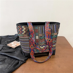 Ethnic large capacity tote bag with bohemian woven pattern and black PU leather base