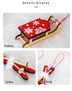 Detail of red wooden Christmas sled ornaments with white snowflakes and faux fur trim