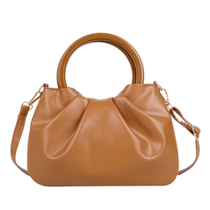 Caramel brown ruched cloud bag with round wooden handles and adjustable shoulder strap