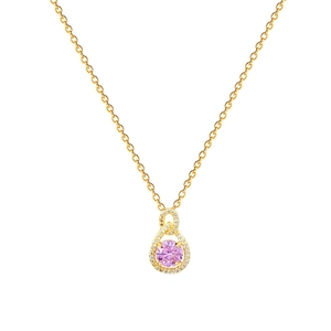 Luxurious gold necklace with a pink pear-shaped gemstone pendant and sparkling accents