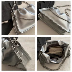 Detail shots of silver leather shoulder bag with textured finish and metal chain