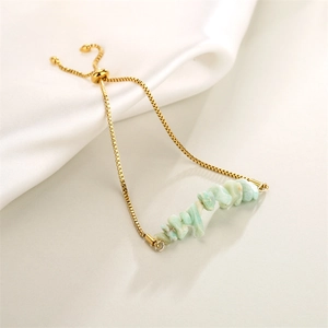 Detail of adjustable stainless steel chain bracelet with light green crystal stone beads
