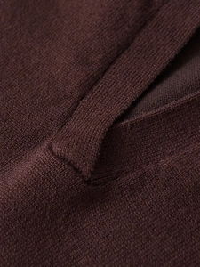 Close-up of the delicate knitted texture and lapel stitching on the coffee brown set