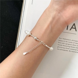 Detail view of S925 sterling silver beaded bracelet with pearls and adjustable clasp